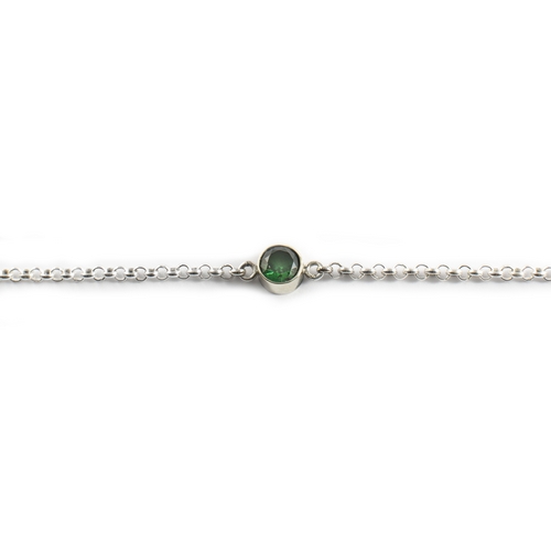 Zilveren armband met askamer achter synt. smaragd