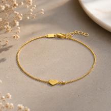 Gouden armband met vingerafdruk op hartje