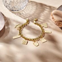 Gouden geboorte armband met losse bedels sfeer