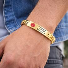 RVS SOS schakel armband met plaat goudkleurig met graveren