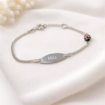 Zilveren kinderarmbandje met lieveheersbeestje rood